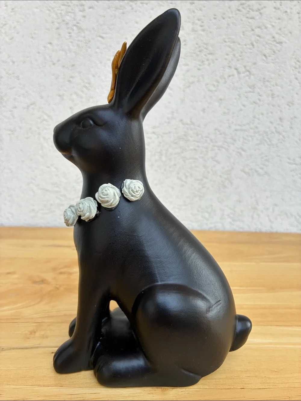Black ceramic jackalope!  With gold horns snd grey rose necklace!  Bunmy figure